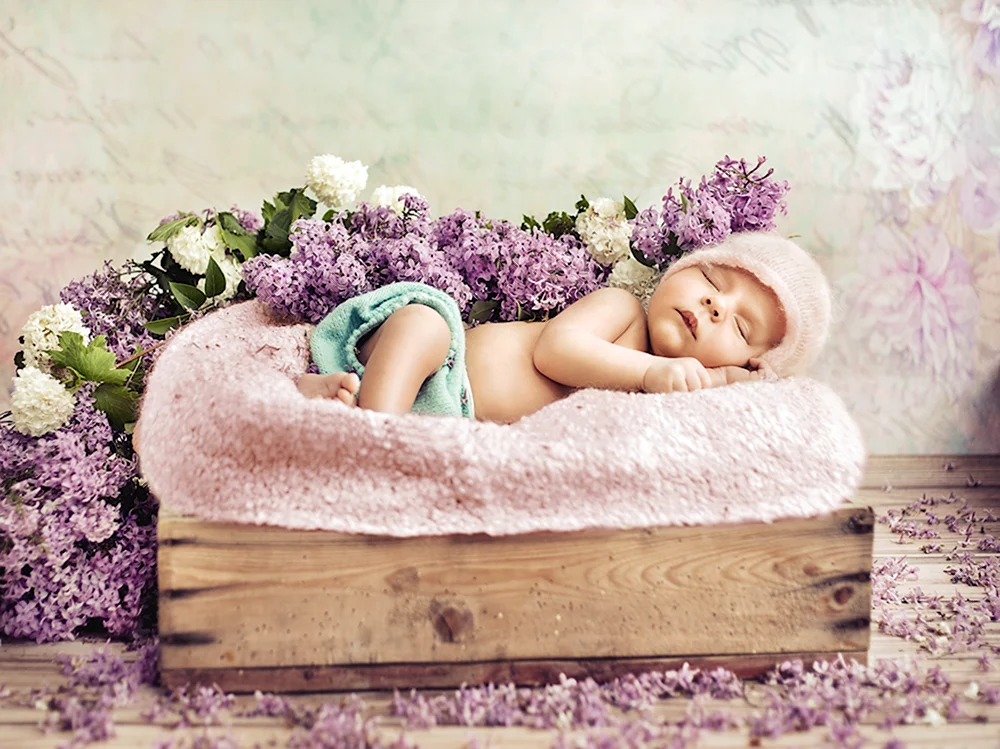 Фотосессия новорожденных в цветах